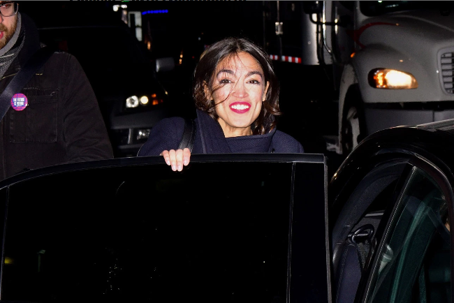 AOC entering a Limo