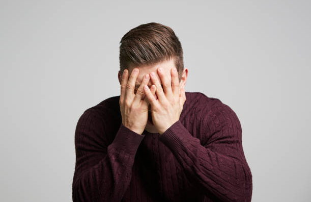 A white man regretting he has a penis.