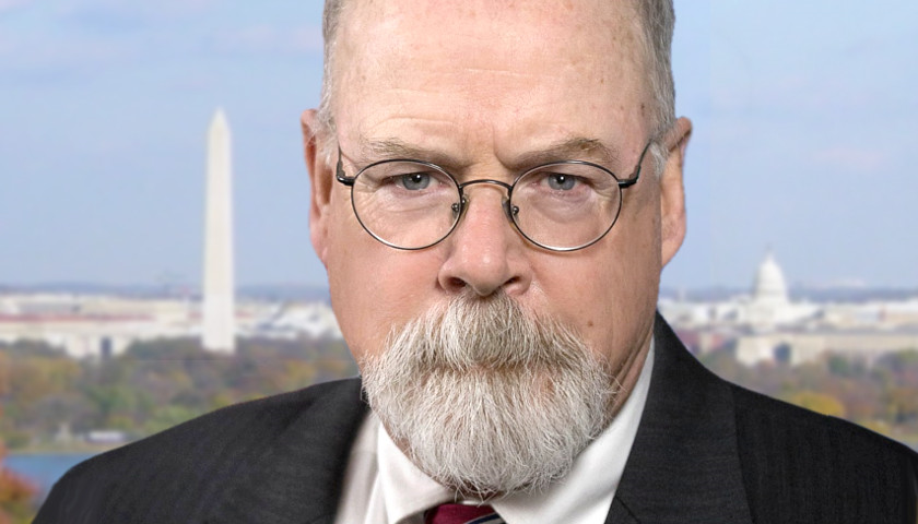 John Durham scowling